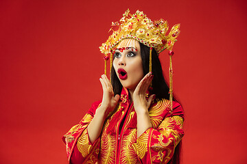 Image showing Chinese traditional woman. Beautiful young girl wearing in national costume