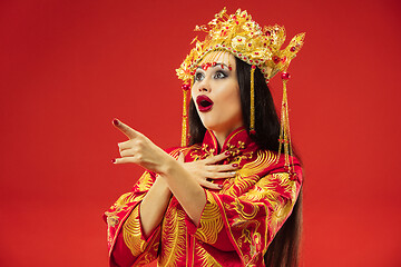 Image showing Chinese traditional woman. Beautiful young girl wearing in national costume