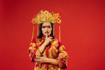 Image showing Chinese traditional woman. Beautiful young girl wearing in national costume