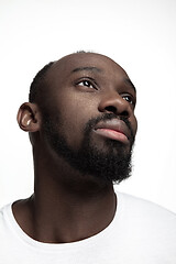 Image showing Close up portrait of a young african man indoors