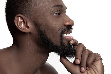 Image showing Close up portrait of a young naked african man indoors