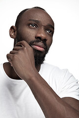 Image showing Close up portrait of a young african man indoors