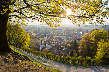 Image showing Panoramic view of Ljubljana, capital of Slovenia. Roooftops of Ljubljanas old medieval city center seen from Ljubljanas castle park at sunset