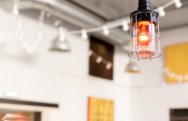 Image showing close up of lamp at modern restaurant