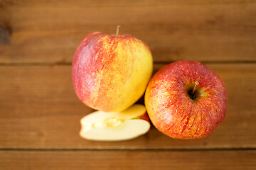 Image showing ripe red apples on wooden table