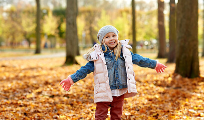 Image showing happy little girl at autumn park