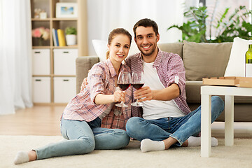 Image showing happy couple drinking red wine at home