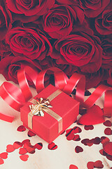 Image showing Valentine gift and red roses, retro color tone
