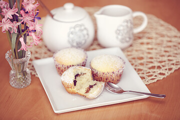 Image showing fresh homemade Muffin on wooden table 