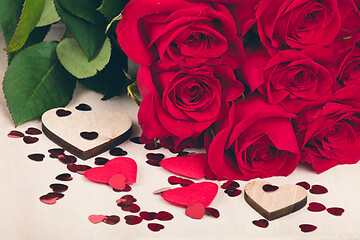 Image showing Small Valentine red hearts and fresh roses