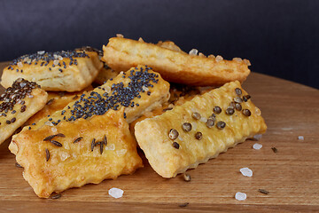 Image showing baked sticks with caraway, poppy, chia seeds, salt