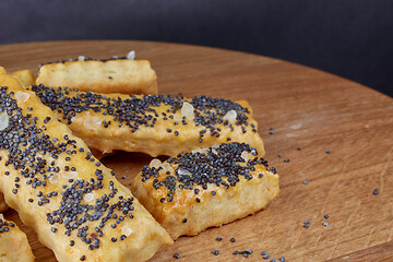 Image showing baked sticks with poppy seeds, salt