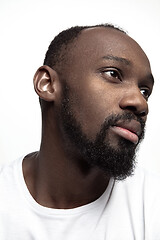 Image showing Close up portrait of a young african man indoors