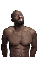 Image showing Close up portrait of a young naked african man indoors