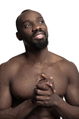 Image showing Close up portrait of a young naked african man indoors