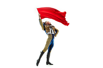 Image showing Torero in blue and gold suit or typical spanish bullfighter isolated over white