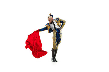 Image showing Torero in blue and gold suit or typical spanish bullfighter isolated over white