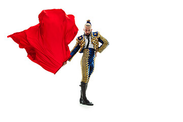 Image showing Torero in blue and gold suit or typical spanish bullfighter isolated over white