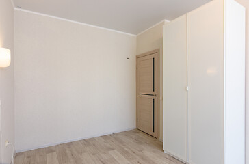 Image showing Entrance to the room, next to the door is a wardrobe