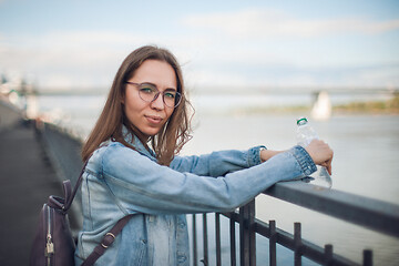 Image showing Young beautiful woman staying