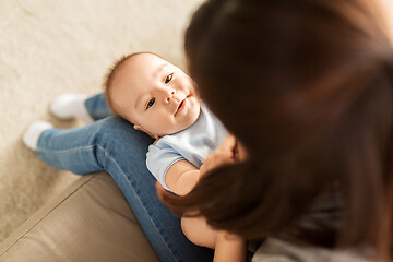 Image showing young mother with little asian baby son at home