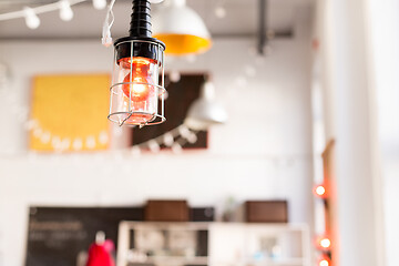 Image showing close up of lamp at modern restaurant