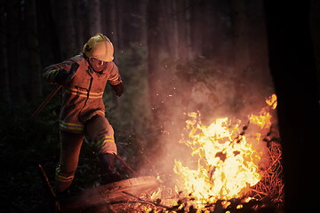 Image showing firefighter in action