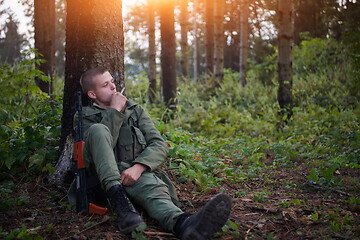 Image showing terrorist have a break