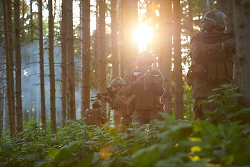 Image showing Modern warfare Soldiers  Squad  in battle