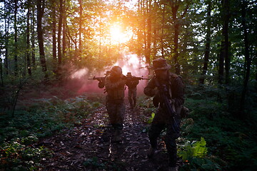 Image showing Modern warfare Soldiers  Squad  in battle