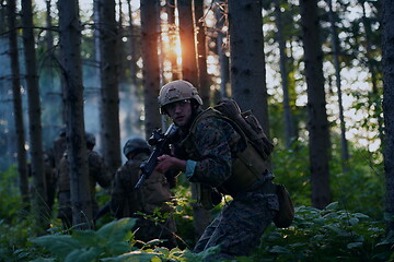 Image showing Modern warfare Soldiers  Squad  in battle