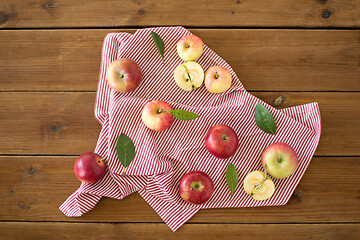 Image showing ripe red apples on wooden table