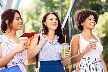 Image showing women with shopping bags and drinks on city street