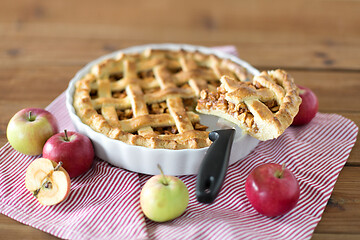 Image showing close up of apple pie piece on kitchen knife