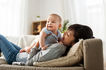 Image showing happy mother with little baby son at home