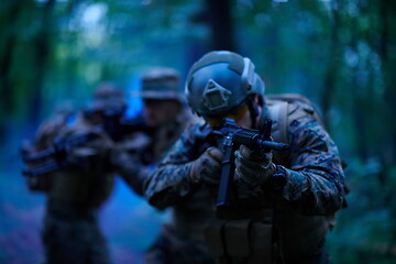 Image showing Modern warfare Soldiers  Squad  in battle