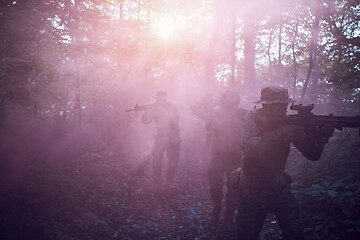 Image showing Modern warfare Soldiers  Squad  in battle