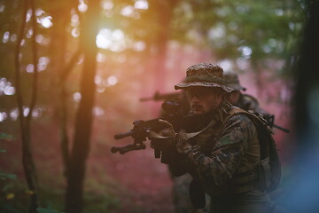 Image showing Modern warfare Soldiers  Squad  in battle