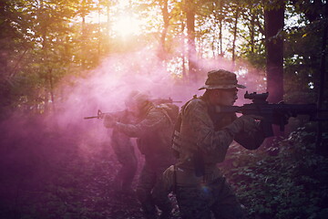 Image showing Modern warfare Soldiers  Squad  in battle