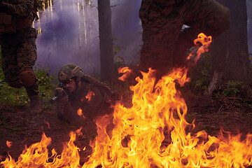 Image showing Modern warfare Soldiers  Squad  in battle