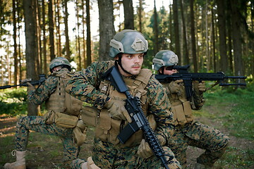 Image showing Soldier fighters standing together