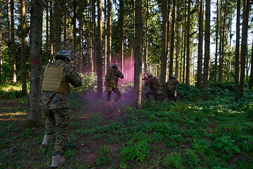 Image showing Modern warfare Soldiers  Squad  in battle