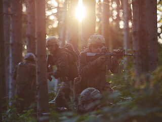 Image showing Modern warfare Soldiers  Squad  in battle