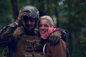 Image showing soldier hugging woman