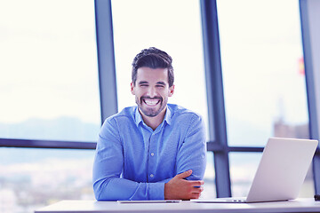 Image showing happy young business man at office