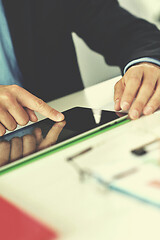 Image showing business man using tablet compuer at office