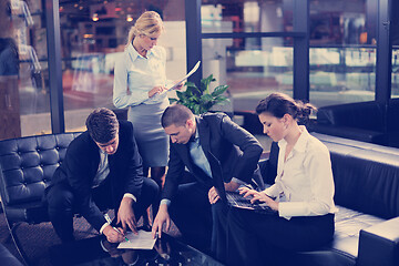 Image showing business people in a meeting at office