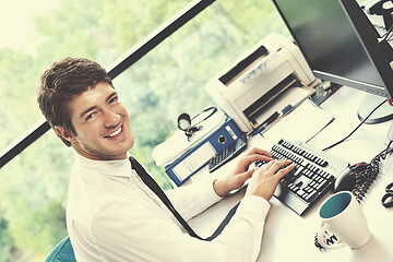 Image showing happy young business man at office