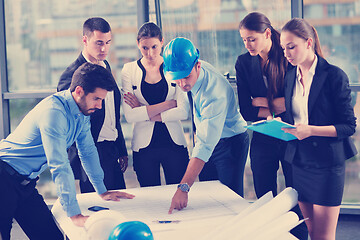 Image showing business people and engineers on meeting