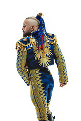 Image showing Torero in blue and gold suit or typical spanish bullfighter isolated over white